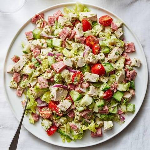 Sliced salami and creamy provolone mingle with tender chicken in this vibrant Italian Deli Chopped Chicken Salad.