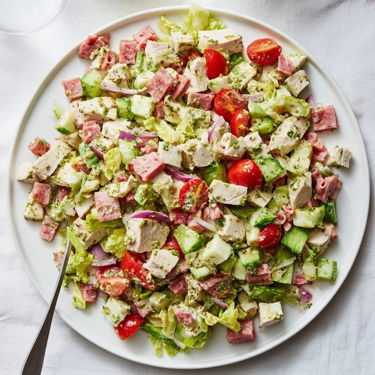 Sliced salami and creamy provolone mingle with tender chicken in this vibrant Italian Deli Chopped Chicken Salad.